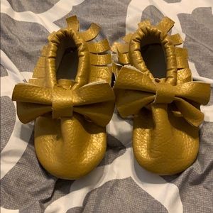 Gold baby moccasins
